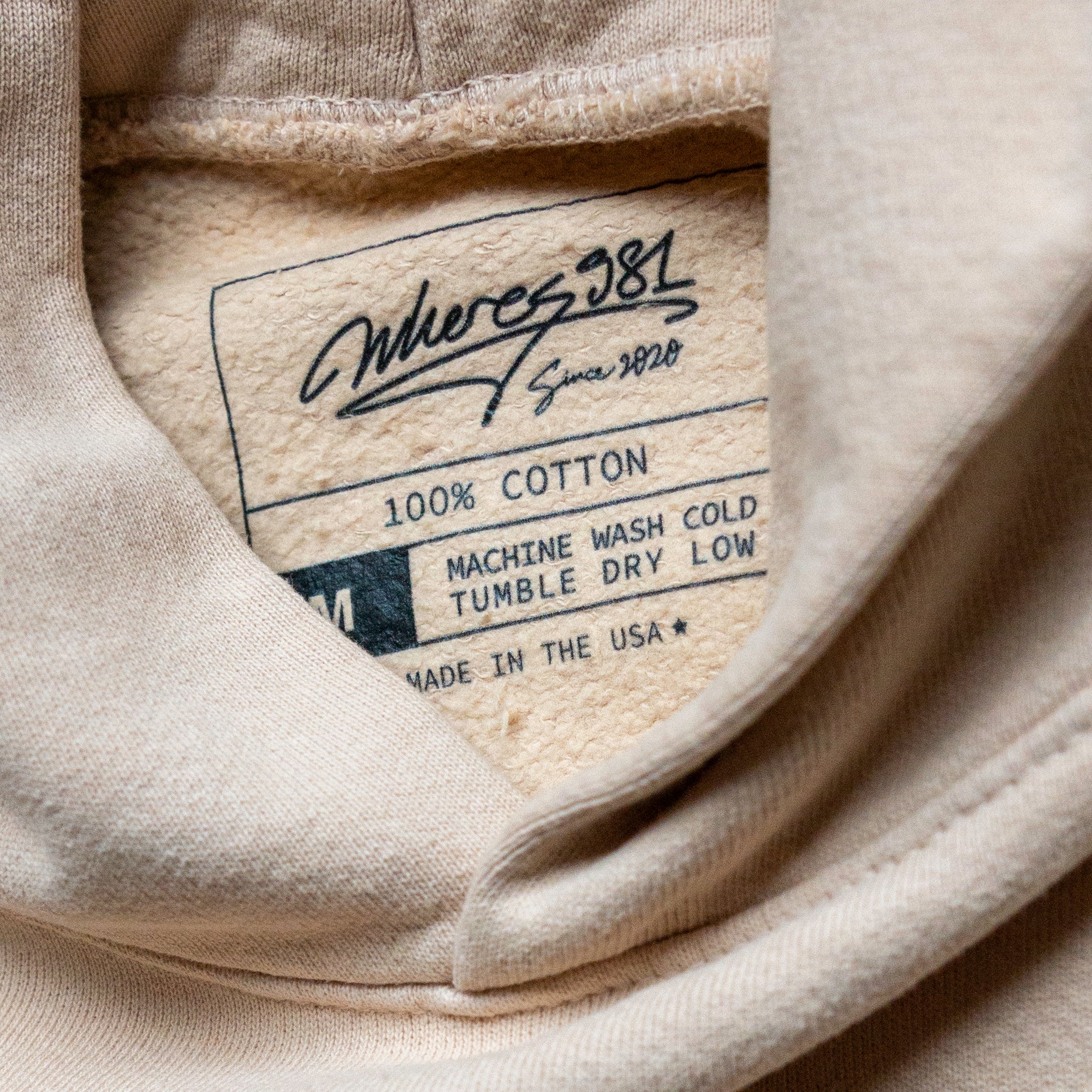 swim> beige hoodie