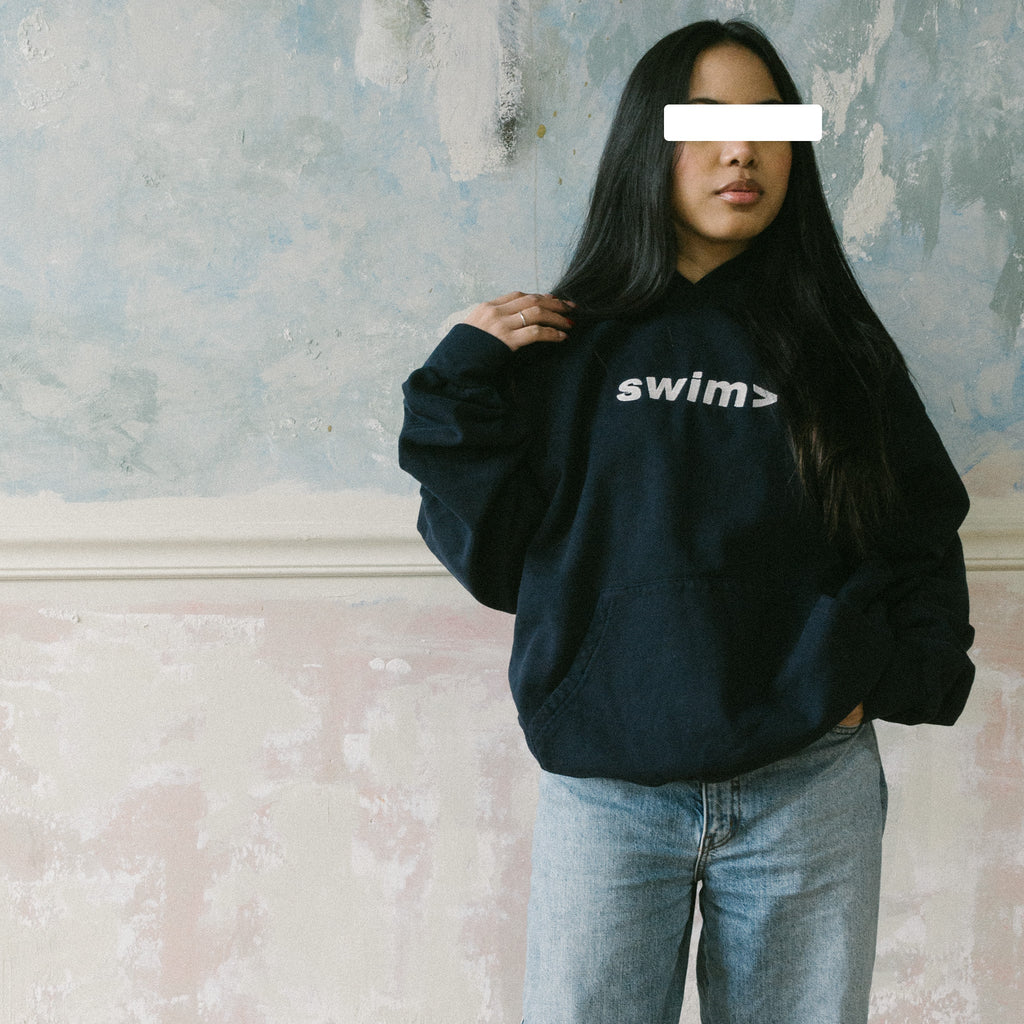 swim> navy hoodie